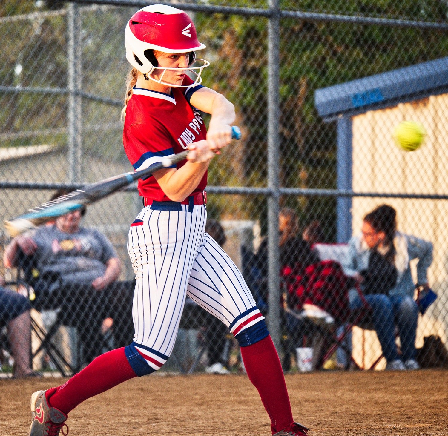 Cacie Lennon squares the bat up for one of her two hits against Fruitvale.